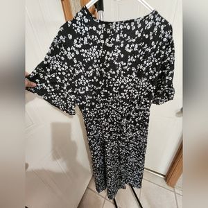 Plus size black dress with white flowers